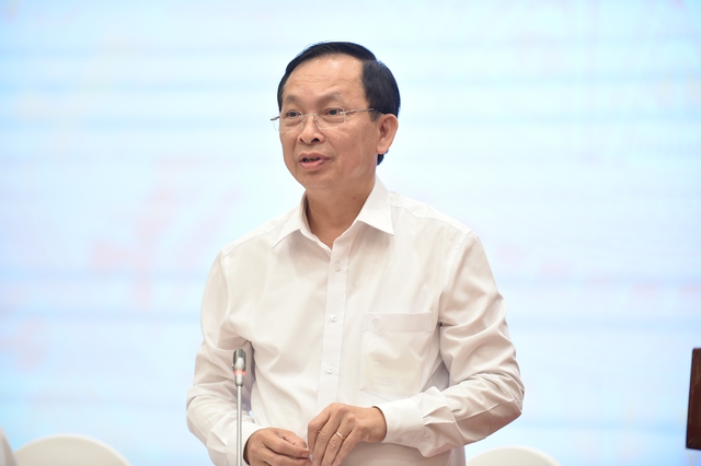 Phó Thống đốc Thường trực NHNN Đào Minh Tú phát biểu tại họp báo. (Ảnh: VGP/Quang Thương)